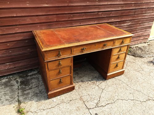 Late Victorian Oak Kneehole Pedestal Desk.