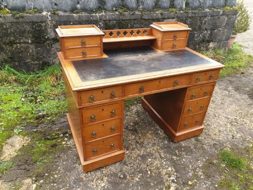 Late Victorian Light Oak Kneehole Pedestal Desk.