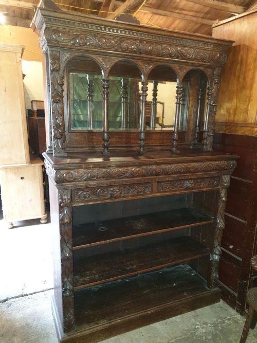 Victorian Carved Oak Green Man Bookcase Cabinet.