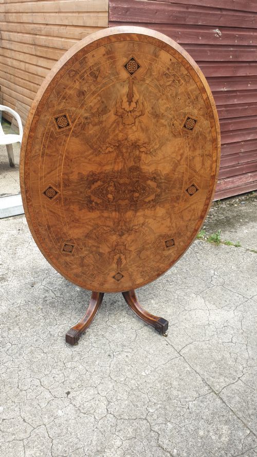 Victorian Inlaid Walnut Oval Tip Top Pedestal Table.