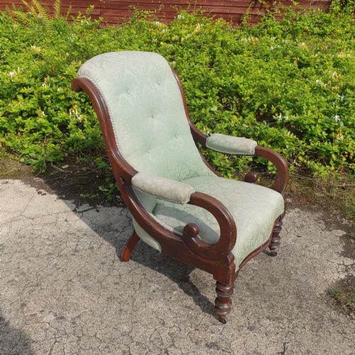 Early Victorian Mahogany Upholstered Scroll Arm Armchair.