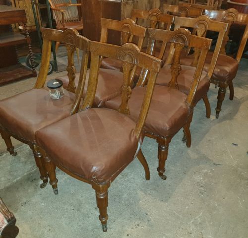 Set of 8 Late Victorian Oak Dining Chairs.