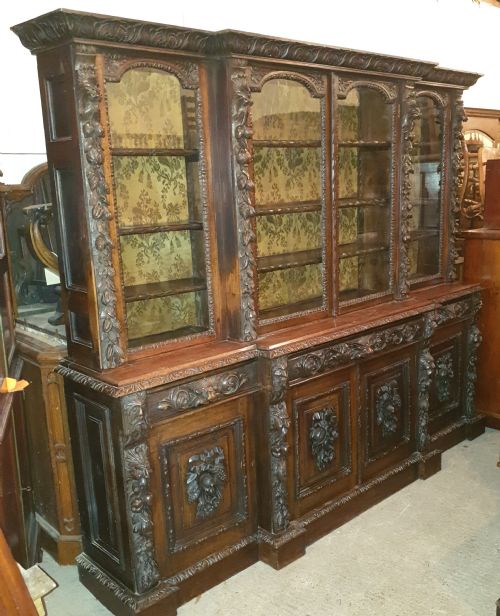 Good Victorian Carved Oak Green Man Breakfront Bookcase.