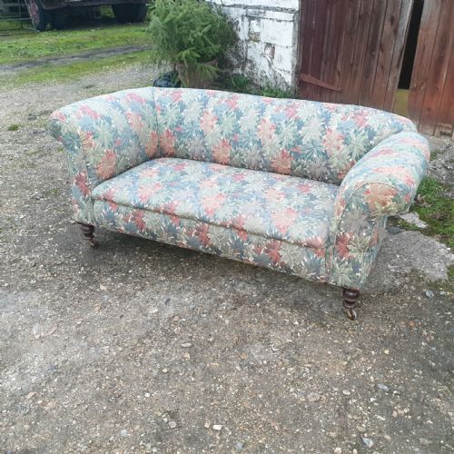 Edwardian Upholstered Chesterfield Sofa with Drop Arm.