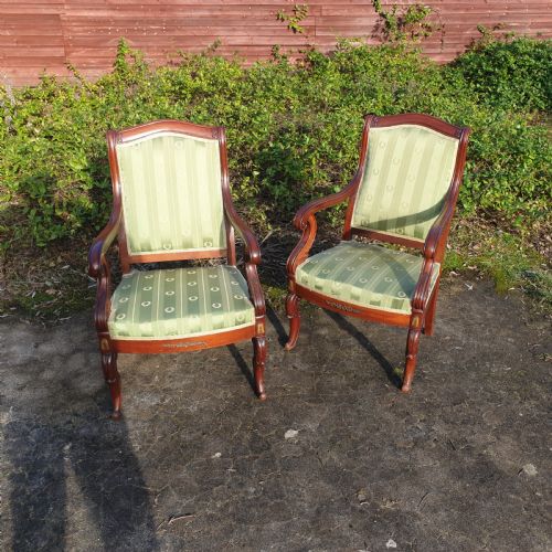 Pair of Mahogany Fauteuil with Gilt Metal Mounts.