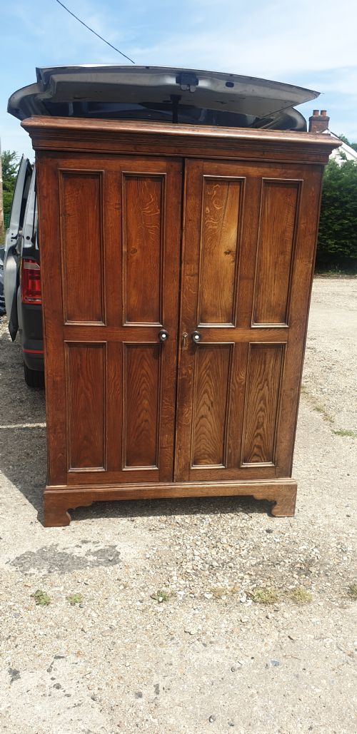 Useful Early Victorian Century Panelled Oak Cupboard.