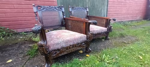 Pair of Carved Mahogany Framed Bergere Armchairs.