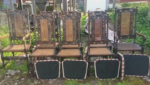 Set of 8 Carved Oak Dining Chairs.