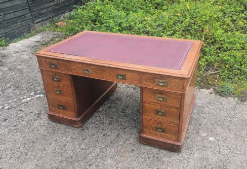 Late Victorian Oak Kneehole Pedestal Desk with Campaign Style Handles.