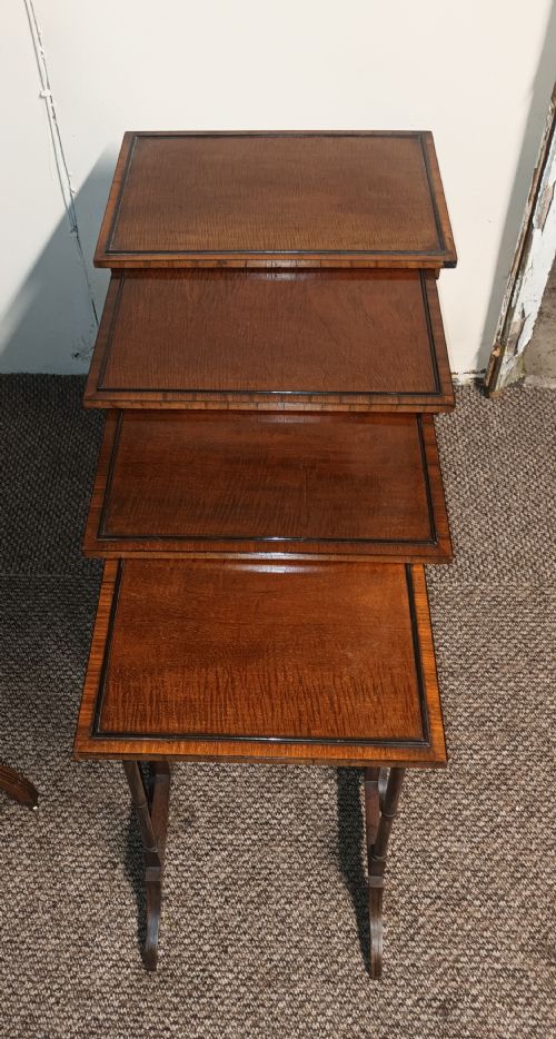 Nest of 4 Mahogany Occasional Table.