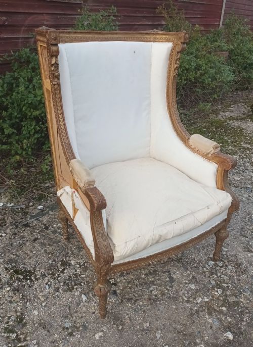 Late 19th Century Carved Giltwood Upholstered Armchair .