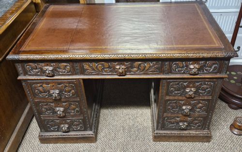 Late Victorian Carved Oak Greenman Pedestal Desk.