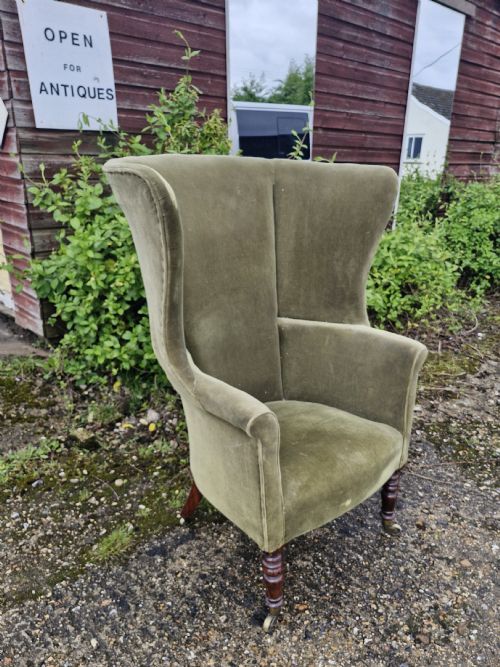 Regency Mahogany Upholstered Wing Barrel Back Armchair.