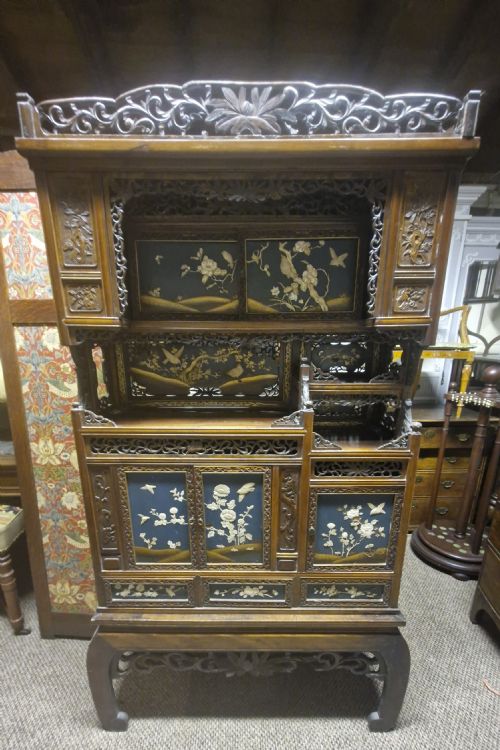 Japanese Inlaid and Carved Cabinet on Stand.