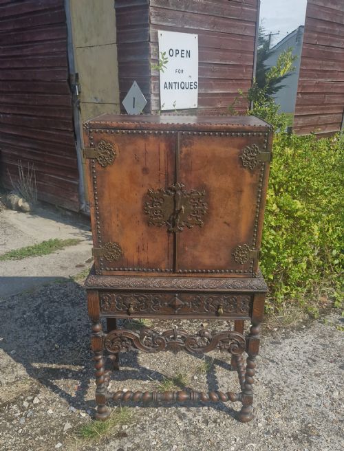 Carved Oak and Leather Cocktail Cabinet