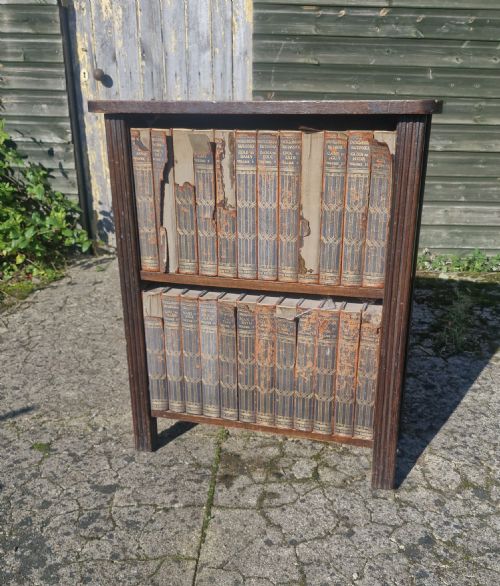 Set of Encyclopedia Britannica in a Mahogany Bookcase.