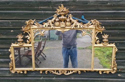 Carved Italian Gilt Wood Overmantel Mirror.