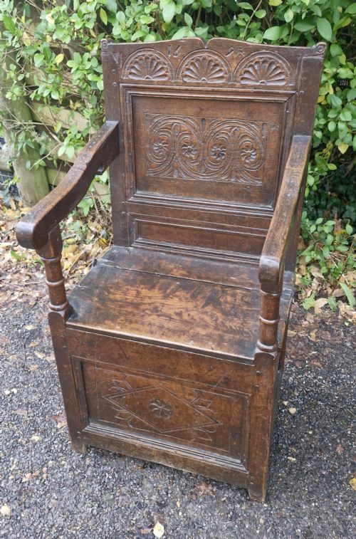 Late 17th Century Oak Panelled Box Seat Armchair.