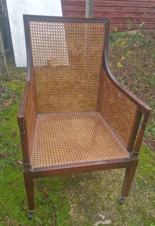 Caned Mahogany Framed Bergere Armchair.