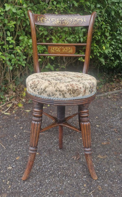 REGENCY BRASS INLAID ROSEWOOD AND SIMULATED ROSEWOOD MUSIC STOOL