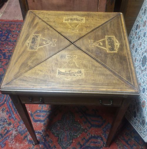 Edwardian Inlaid Mahogany Swivel Top Games Table.