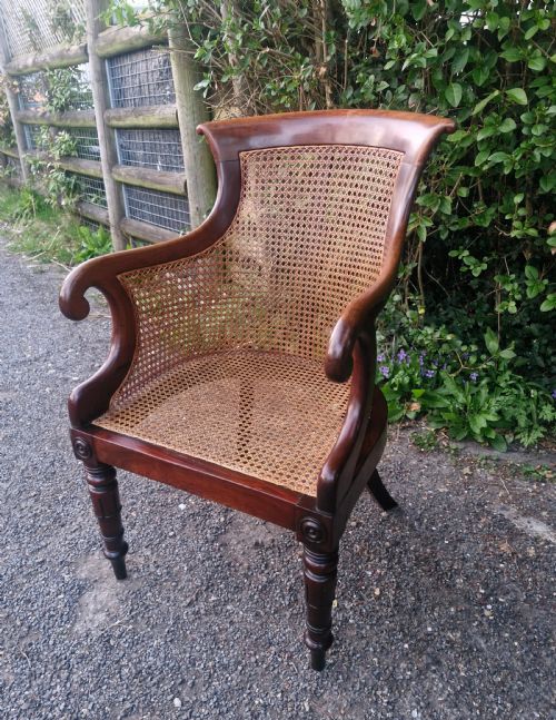 Regency Mahogany Bergere Library Armchair.