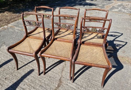 Set of 6 Simulated Rosewood Dining Chairs with Metal Mounts and Original Squabs.