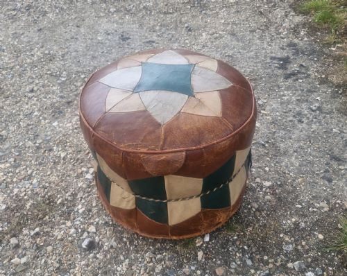 Upholstered Pouffe.