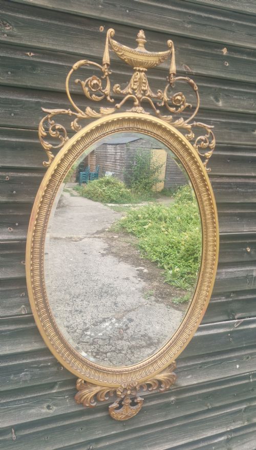 Edwardian Gilded Oval Wall Mirror.
