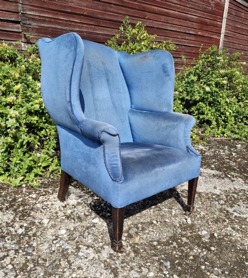 Good Sized Upholstered Wing Back Armchair.