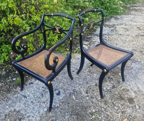 19th Century Ebonised Gilt Metal Mounted Sabre Leg Armchair Plus Matching Single Chair.