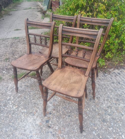 Set of 4 Unusual Design Windsor Chairs.