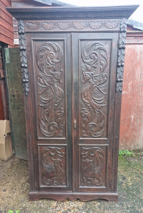 USEFUL LATE VICTORIAN CARVED OAK 2 DOOR CUPBOARD FITTED SHELVES - ADDITIONAL PHOTO 1