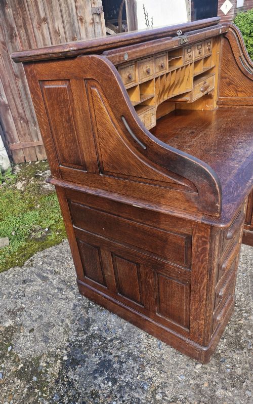 PANELLED OAK TAMBOUR TOP ROLL TOP PEDESTAL DESK - ADDITIONAL PHOTO 10