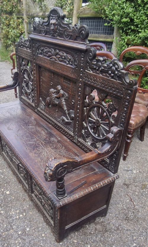 LATE 19TH CENTURY CARVED OAK HALL BENCH WITH LIFT UP SEAT - ADDITIONAL PHOTO 3
