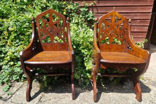 PAIR OF VICTORIAN OAK GOTHIC HALL CHAIRS