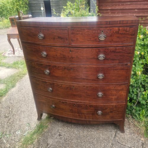 LARGE REGENCY MAHOGANY BOW FRONT CHEST OF DRAWERS