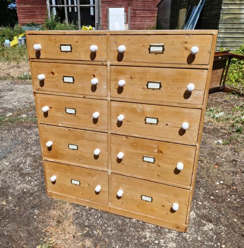 BANK OF PINE DRAWERS