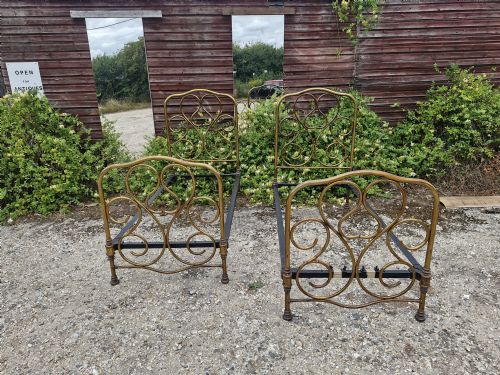 Pair of Brass Single Beds.
