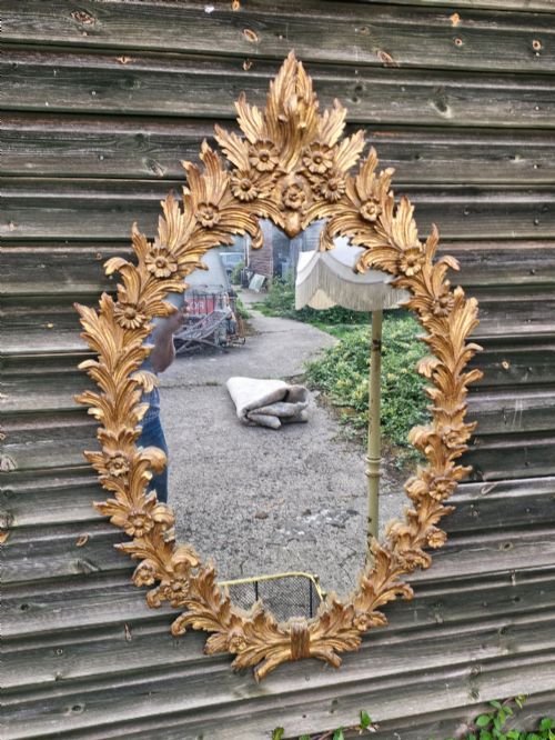 Carved Oval Wall Mirror.