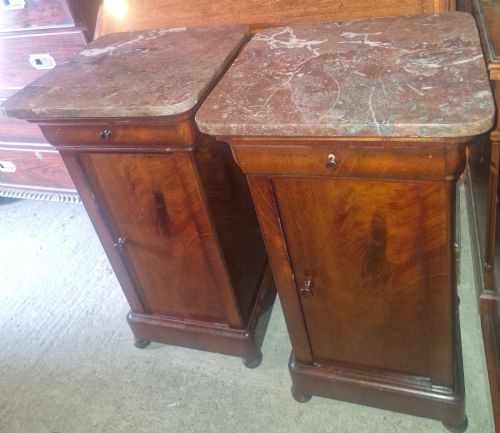 Pair of French mahogany bedside cabinets.