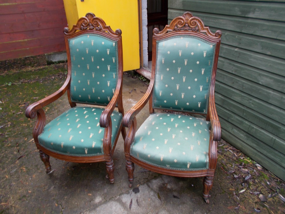 Pair of rosewood armchairs.