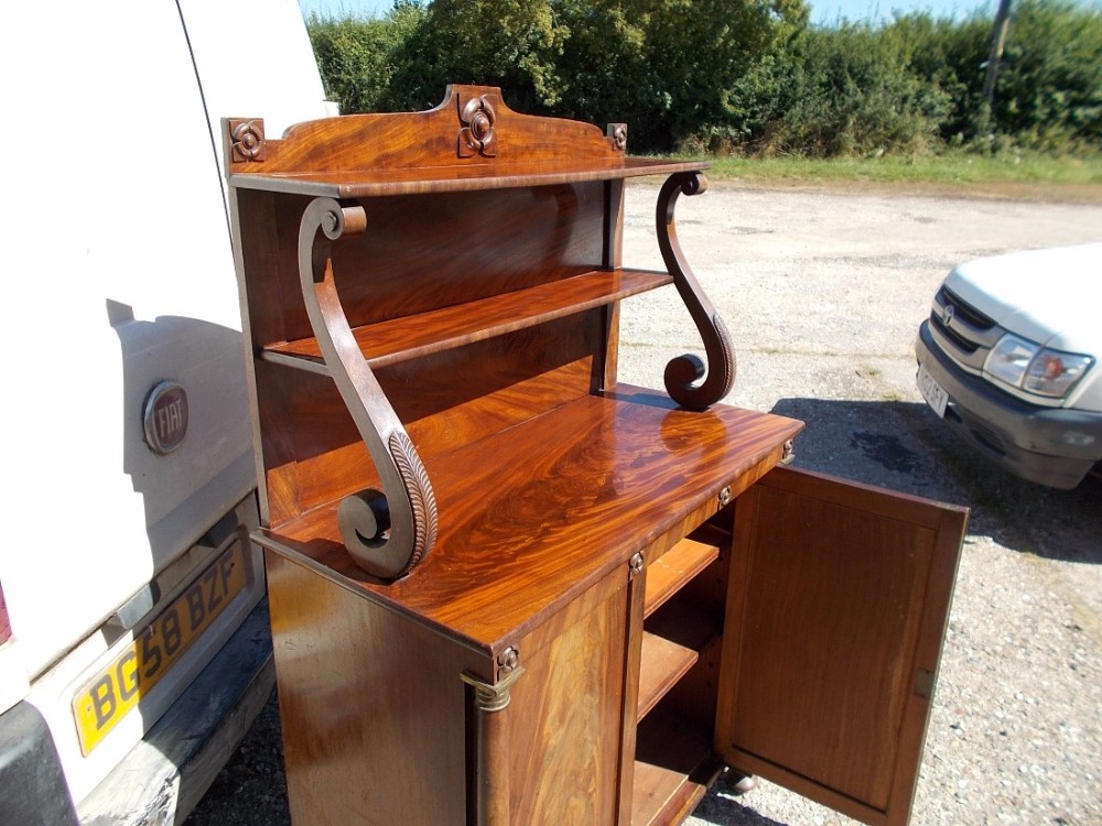 Regency mahogany 2 door side cabinet with gilt metal mounts.