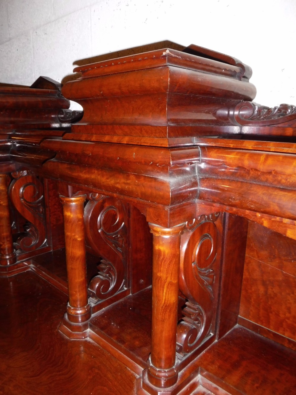 A large Regency mahogany side cabinet featuring turned support columns, panelled cupboard doors, and a tier of raised shelves. View XIV