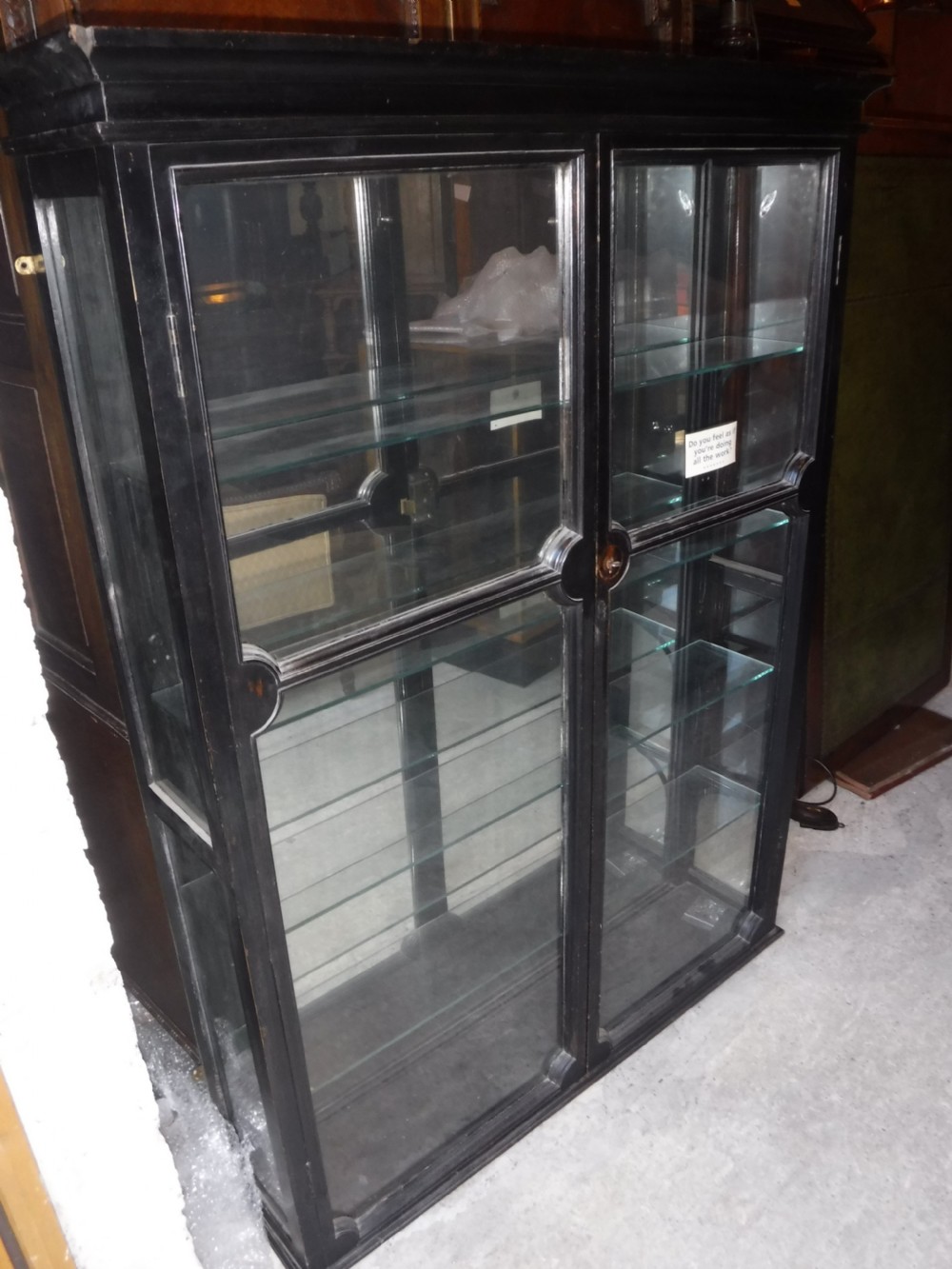Ebonised wall mounted mirror backed shop display cabinet View II