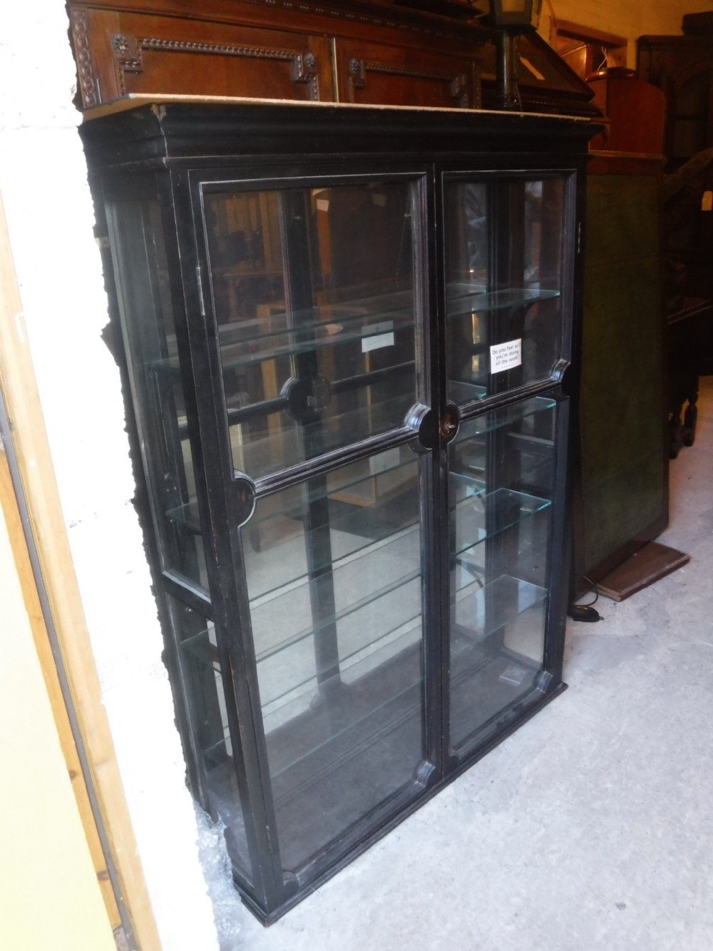 Ebonised wall mounted mirror backed shop display cabinet View III