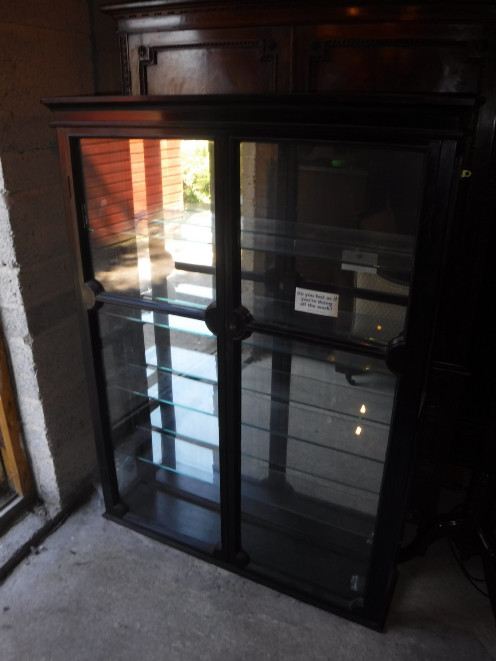 Ebonised wall mounted mirror backed shop display cabinet View IV