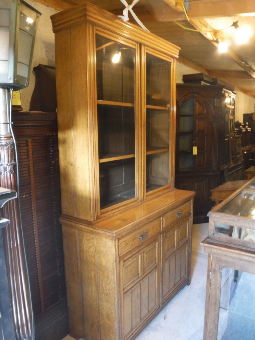 Good clean and practical Late Victorian  light oak bookcase cabinet