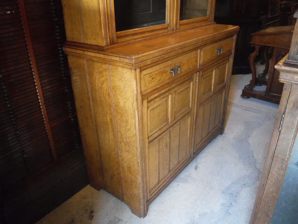 Good clean and practical Late Victorian  light oak bookcase cabinet View II
