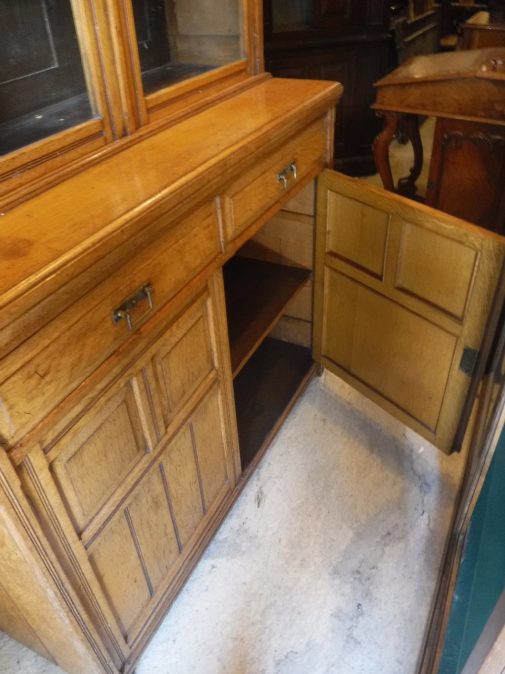 Good clean and practical Late Victorian  light oak bookcase cabinet View III